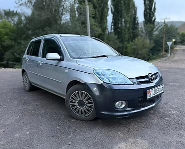 Унаа сатуу: Mazda Demio: 2005 г., 1.4 л, Автомат, Бензин, Хетчбек — 1