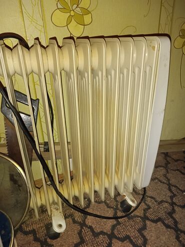tap az radiatorlar: Yağ radiatoru