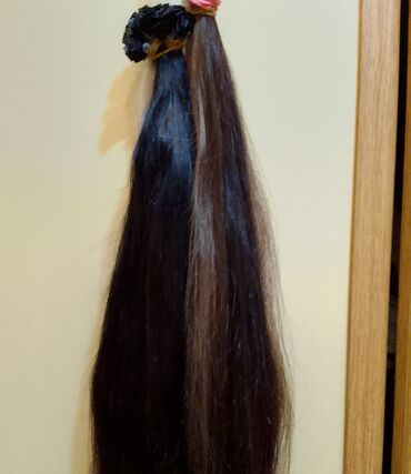 продам натуральные волосы: Продам натуральные волосы для наращивания 55см.цвет темный,в наличии