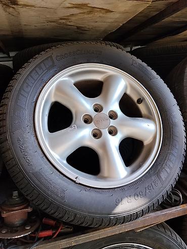 Колесо в сборе: шина + литой диск Subaru. - Шина: Michelin