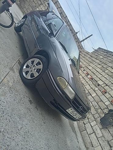 Opel: Opel Astra F hatchback Xüsusiyyətlər: - Korpus: 5 qapılı hatchback - — 1
