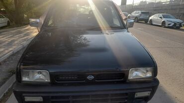 монолитный домкрат: Nissan Март: 1990 г., Хетчбек