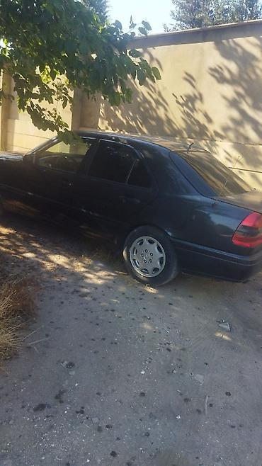 Mercedes-Benz C‑Class (W202) sedan - Korpus: 4 qapılı sedan, qara lalafo.az -da Mercedes-Benz C‑Class (W202) sedan - Korpus: 4 qapılı sedan, qara