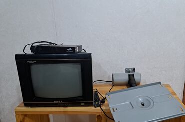 скупка старых телевизоров: Televizor və pristavka. Divara vurulan altlıq. İşlənmişdir