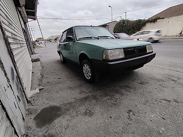 Tofas: Model: Tofaş Şahin (sedan) Kuzov: 4 qapılı, açıq yaşıl rəng Yanacaq — 2
