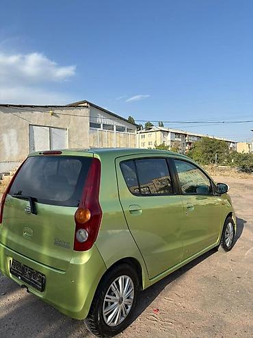 Daihatsu Cuore: 2008 г., 1 л, Механика, Бензин, Хэтчбэк — 7