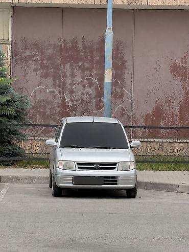 byd e1: Daihatsu Cuore: 2001 г., 1 л, Автомат, Бензин, Купе — 4