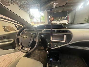 тойота аква гибрид: Toyota Aqua: 2013 г., 1.5 л, Автомат, Гибрид — 3