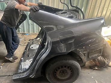 Кузовные детали: Toyota sedan arxalig — 2