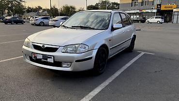 bmb e36: Mazda 323: 1999 г., 1.6 л, Механика, Бензин, Универсал — 1