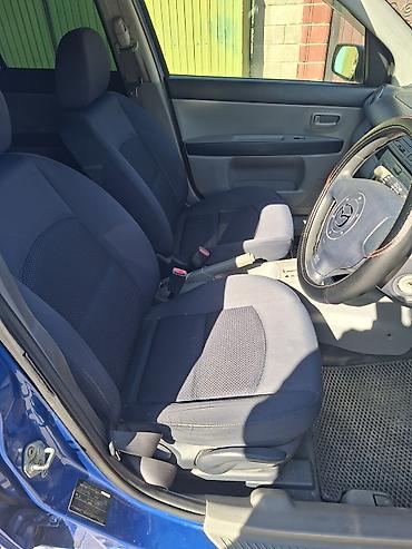 low ll: Mazda Demio: 2003 г., Автомат — 10