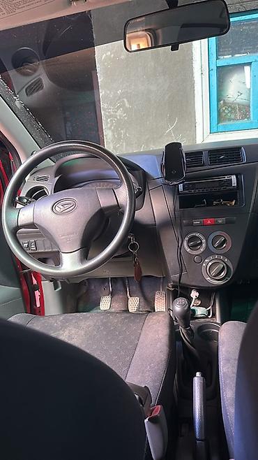 265 70: Daihatsu Cuore: 2009 г., 1 л, Механика, Бензин, Хэтчбэк — 5
