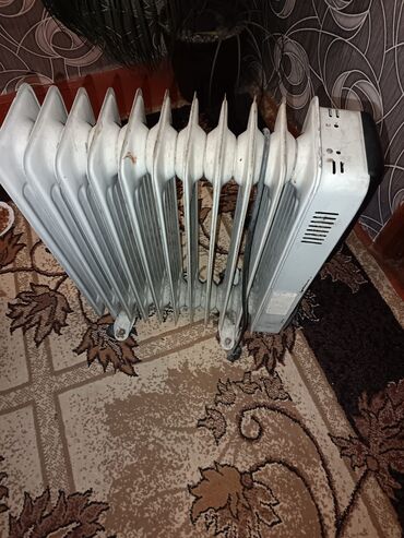 radiator istilik: Yağlı radiator, otağı tez və səmərəli şəkildə isitmək üçün idealdır