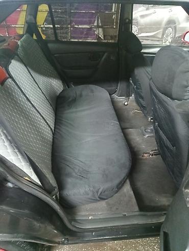 Daewoo: Daewoo Nexia: 2012 г., 1.6 л, Механика, Бензин, Седан — 11