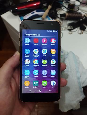 ses ucaldan: Samsung Galaxy J2 Core, 8 GB, rəng - Qızılı — 7