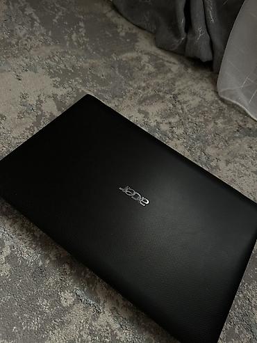 black sharp: Ноутбук Acer, классический черный корпус с текстурированной крышкой — 1