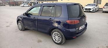обмен с доплатой: Mazda Demio: 2003 г., Автомат, Бензин — 7