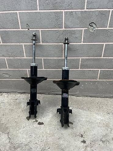 Амортизаторы, пневмобаллоны: Передний амортизатор Subaru — 1