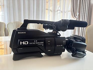 watt pro: Sony HXR-MC2500 peşəkar video-kamera - Full HD 1920x1080 (AVCHD — 2