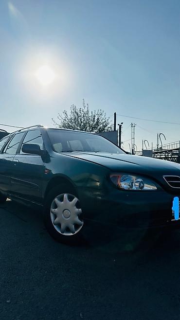 mazda 323 2003: Nissan Primera: 2001 г., 1.8 л, Механика, Бензин, Универсал — 3