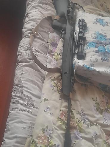 Təsvir: - Yaylı (break-barrel) pnevmatik tüfəng - Sintetik qara