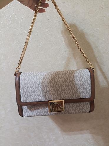 Çantalar: Michael kors çanta satılır.
originaldı.
2 defe tutulub.
teze kimidi — 3