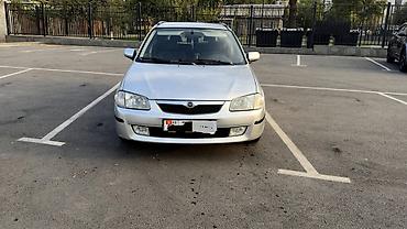 bmb e36: Mazda 323: 1999 г., 1.6 л, Механика, Бензин, Универсал — 2