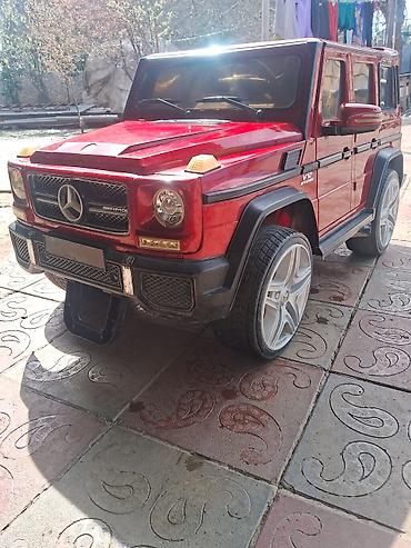 купить коляску анекс бу: Uşaq üçün elektrikli mini avtomobil – G‑Class üslubunda, qırmızı rəng — 2