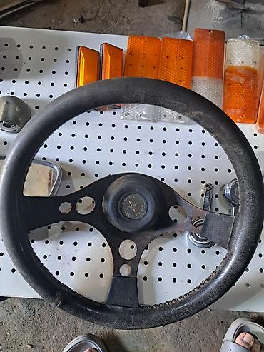 prado sükan: Ford Mustang sükan çarxı.
Unvan Merdekan — 1