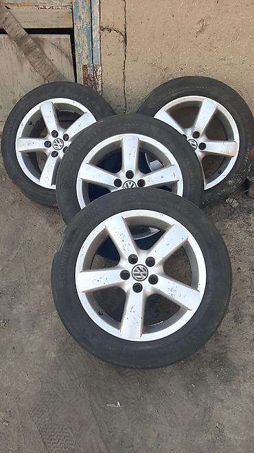 сиденья volkswagen: Комплект из 4 легкосплавных дисков Volkswagen с шинами Kumho Ecowing — 1