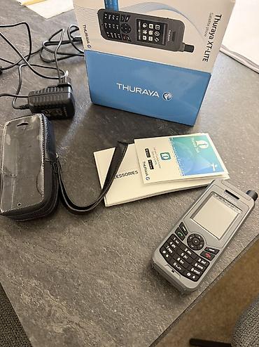 Продаю новый спутниковый телефон THURAYA XT-LITE. Новый в полном