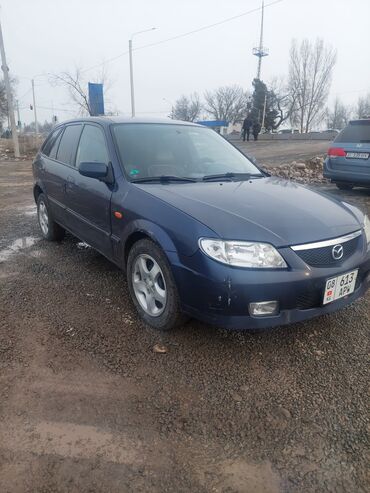 машины пасат: Mazda 323: 2001 г., 1.6 л, Механика, Бензин, Лимузин