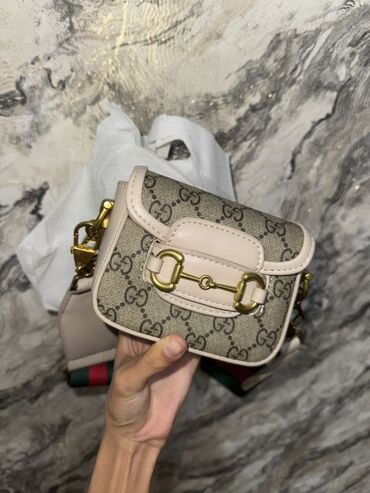 İnformatika: Çiyin çantası, Gucci, Yeni