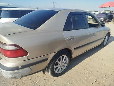 бу тачила: Mazda Capella: 1998 г., 1.8 л, Механика, Бензин, Седан — 2