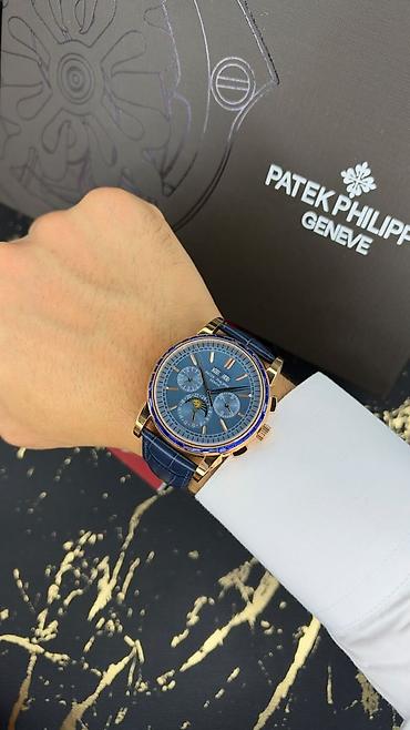saat samdan: Patek Philippe Geneve kişi qol saatı – mavi günəş şüalı siferblat və — 1