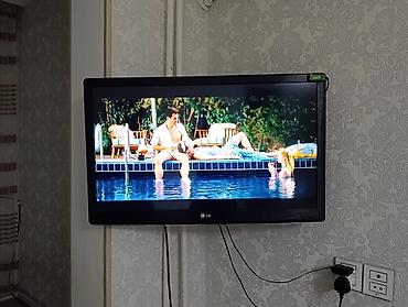 Televizorlar: LG LCD/LED televizor, divara montajlı. - Ekran ölçüsü: təxminən 32" — 3
