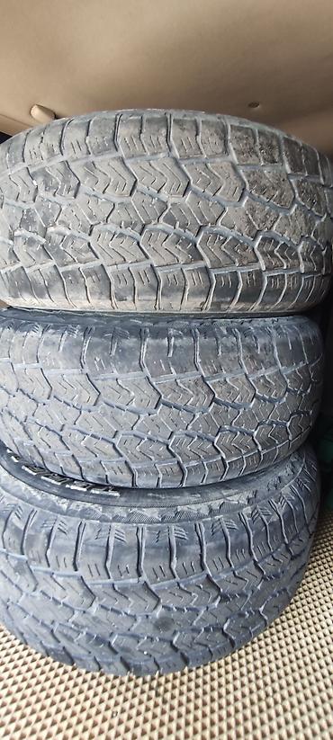 245 65 17: Комплект из 4 автомобильных шин A/T (всесезонный/внедорожный рисунок — 1