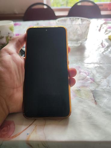 redmi 11: Xiaomi Redmi smartfon - Model: Redmi (arxa qapaqda “Redmi” loqosu) — 1