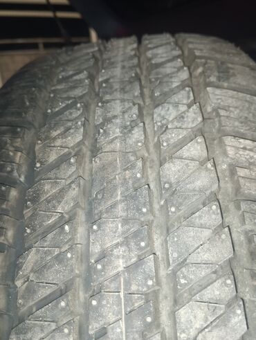 Сковородки: Bridgestone Dueler avtomobil təkəri gümüşü rəngli disklə birlikdə