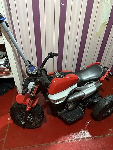 Uşaq üçün elektrik maşınları: Uşaq elektrik motosikleti (3 təkərli) 650manata alınıb 250 manata — 3