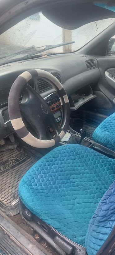 машина кейж: Kia Clarus: 1998 г., 1.8 л, Механика, Бензин, Седан