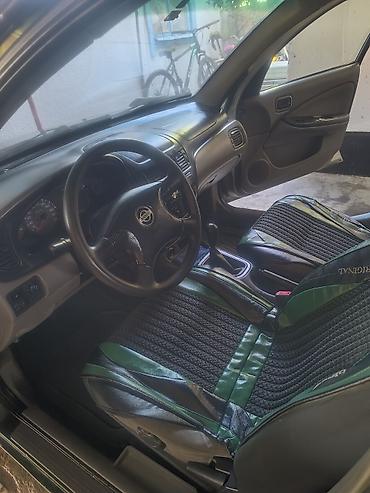 sl 55: Nissan Almera: 2000 г., Механика, Седан — 6