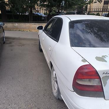 х5 bmw: Daewoo Nubira, белый седан. Особенности и комплектация: - Кузов — 4