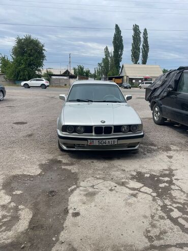 опель фронтера б: Автомобиль BMW 5-й серии в кузове E34, выполненный в серебристом