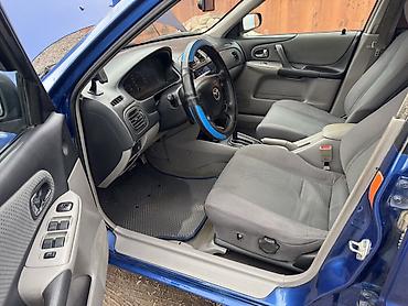 Mazda: Mazda 323: 2000 г., Хэтчбэк — 9