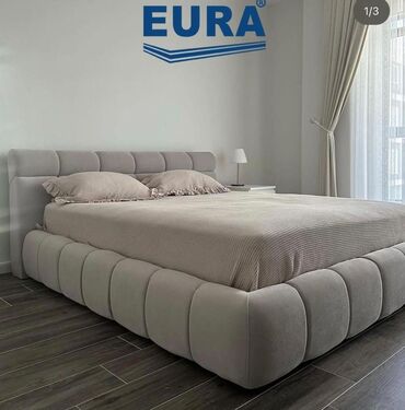 гүл урук: Мягкая двуспальная кровать Eura с обивкой из приятной на ощупь ткани