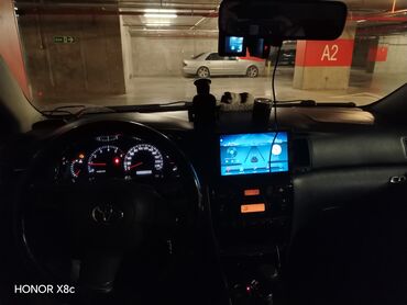 Toyota: Toyota Corolla: 1.4 l | 2004 il Sedan — 11