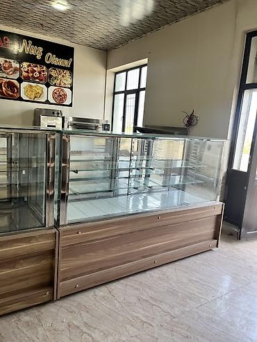 Soyuducu vitrinləri: Soyuducu vitrin + kassa şkafı Çox az istifadə edilib. Yeni kimidir — 6