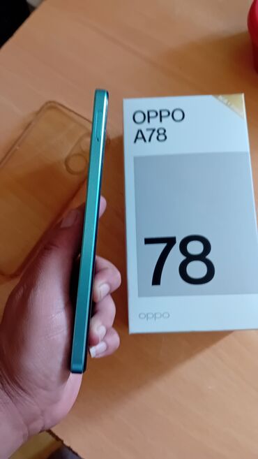 телефон fly bl6418: Oppo A78 5G, 256 ГБ, цвет - Голубой, Сенсорный, Отпечаток пальца, Две SIM карты