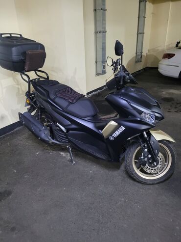 Ножи: Yamaha skuter – şəhər içi sürüş üçün tam praktiki və funksional model